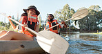 Couple, kayak and rowing on a lake in nature for sports challenge, adventure or travel with a smile. Young man and woman friends together on boat and water for fitness, travel and holiday for freedom