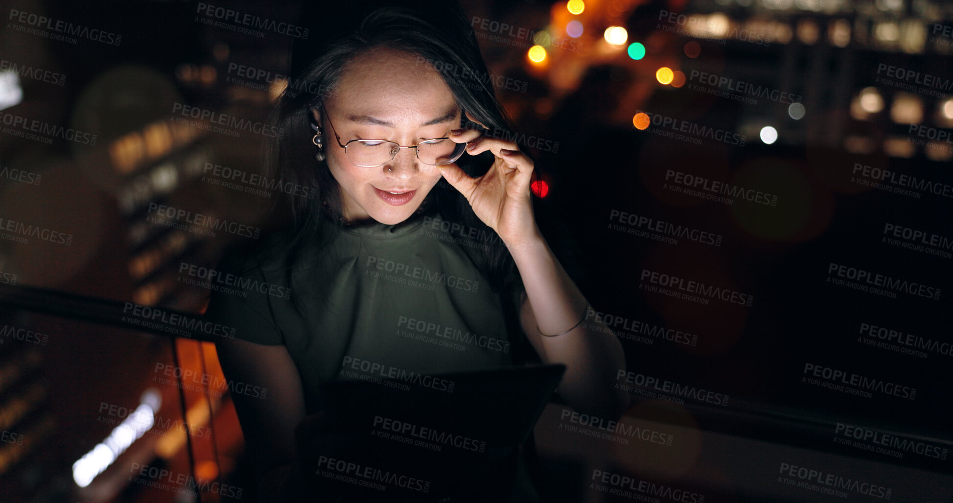 Buy stock photo Glasses, tablet and Asian woman in night office, working late on project deadline or research. Tech, overtime and female employee with touchscreen reading email, report or proposal in dark workplace.