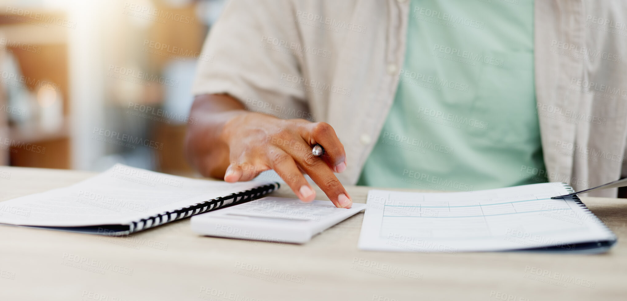 Buy stock photo Budget, paperwork and calculator with man hands writing for accounting, debt review and tax management or calculating. Financial report, documents and person with mortgage, bills and finance strategy