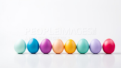 Buy stock photo Row of colorful easter eggs on white copysapce background. Chocolate candy in studio