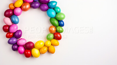 Buy stock photo Circle of colorful easter eggs on white copyspace banner background. Festive candy in studio