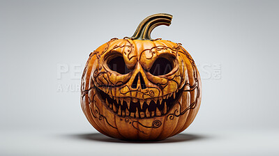Carved halloween pumpkin on white copyspace background. Evil Jack-o-lantern face