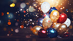 New Year celebration Festive background with falling confetti, balloons and bokeh lights.