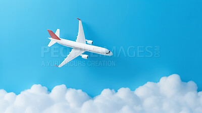Airplane on blue copyspace background with clouds. Sustainable travel, zero emissions travel concept