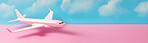 Airplane on pink and blue copyspace background. Sustainable travel, zero emissions travel concept