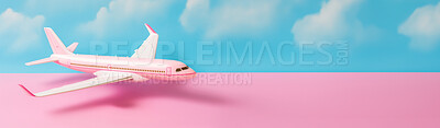 Airplane on pink and blue copyspace background. Sustainable travel, zero emissions travel concept