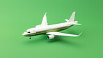 Airplane green copyspace background. Sustainable travel, zero emissions and biofuel concept.