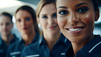 Group of smiling stewardess cabin crew. Friendly service travel concept