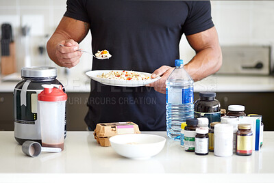 Buy stock photo Nutrition, health diet and bodybuilder supplements of a man cooking breakfast for protein and muscle. Kitchen, bulking medicine and male athlete with food and morning meal for power and body care