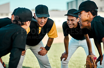 Buy stock photo Shot of a baseball coach talking to his team while out on the pitch