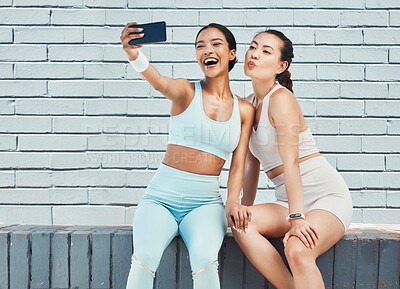 Buy stock photo Fitness friends, phone selfie and picture for social media, influencer content and happy workout after exercise and training by brick wall. Fit females take wellness, fun and online motivation photo