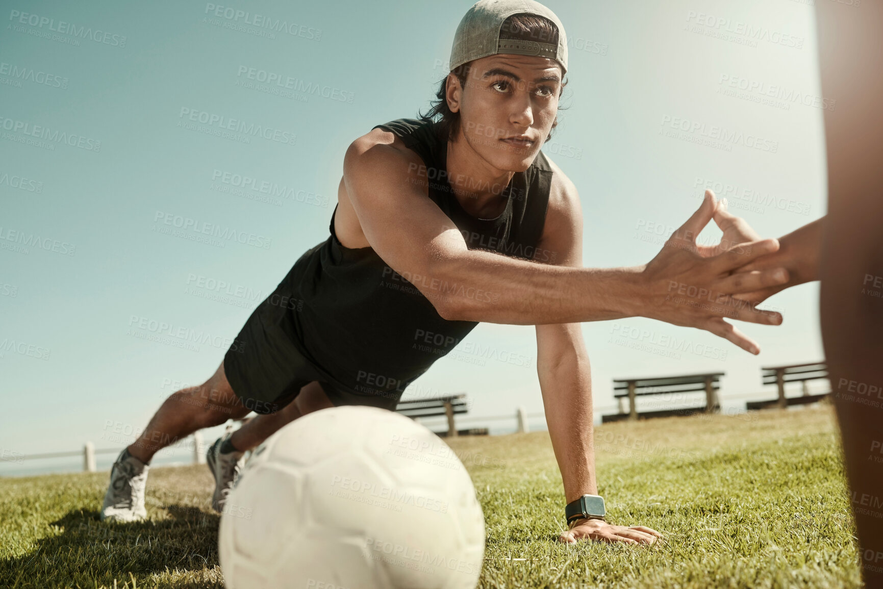 Buy stock photo Soccer, fitness and friends doing push up on grass in summer holidays for training, exercise and body workout. Football, healthy and young men hands touching while exercising outdoors in Sao Paulo 