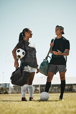 Buy stock photo Soccer ball, woman or man on grass field after fitness, training or exercise for competition game or match. Smile, happy or talking football players, sports people or team after energy health workout