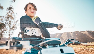 Buy stock photo Moto cross, arm stretching and man in nature on motorbike for competition workout. Desert ride, motorcycle training and exercise focus of an extreme motorbike sports athlete on a dirt road for sport