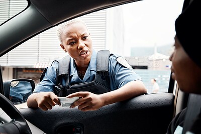 Buy stock photo Talking, drivers license or police officer in city to check info for law enforcement, protection or street safety. Black woman, traffic stop or cop on security patrol for road block or crime justice