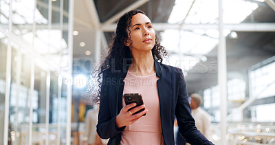 Buy stock photo Thinking, phone and travel with business woman for networking, search and communication. Future, planning and vision with person in new york office building for mobile app, technology and schedule