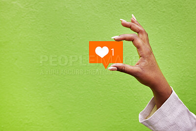 Buy stock photo Hand, heart and like emoji with a person on green background mockup in studio for social media. Banner space, icon and post with an adult holding a logo closeup for communication or networking