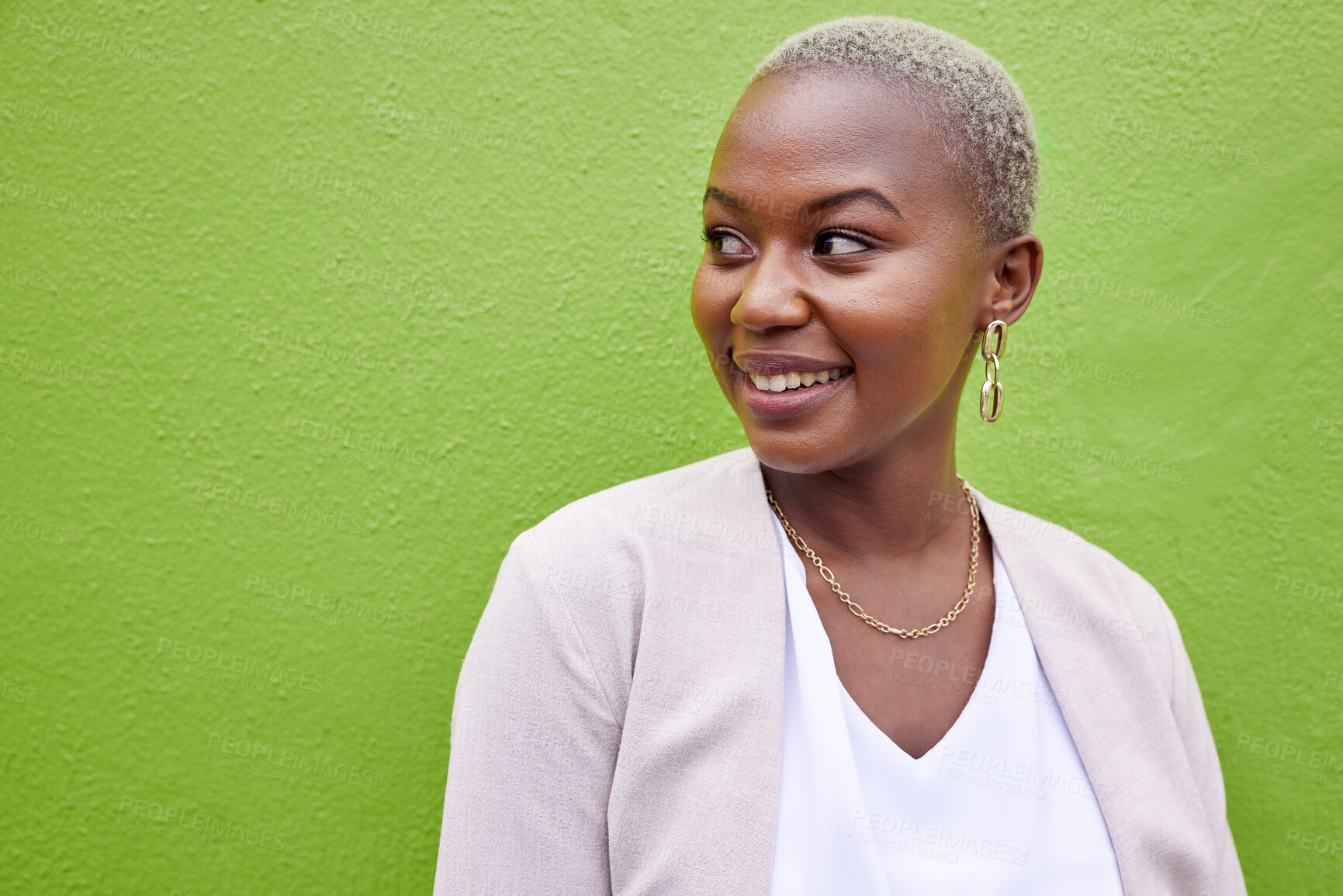 Buy stock photo Young African woman, thinking and wall with smile, ideas and planning for future by green background. Girl, happy and excited with vision, decision and choice for career path, life or remember goal