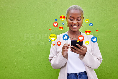 Buy stock photo Phone icon, black woman and social media emojis of heart, thumbs up and smile for mockup advertising space. Cellphone, like opinion notification and user typing communication on green background wall