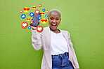 Portrait, excited black woman and phone emojis, social media icons and thumbs up notification. Smartphone communication, like opinion vote and African user show feedback on green background wall