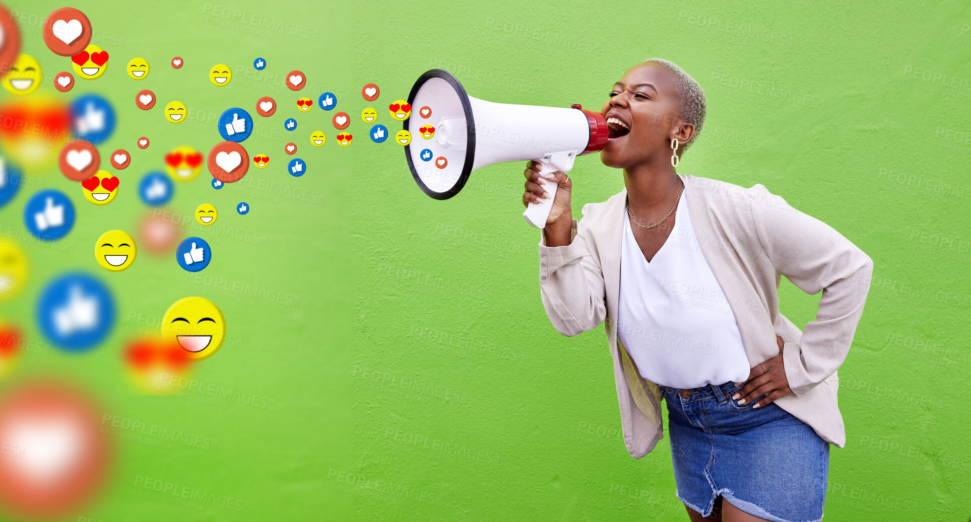 Buy stock photo Megaphone, emoji communication and social media with a black woman in studio on a green background. Speech, announcement and a young person shouting into a loud speaker to like, comment or share