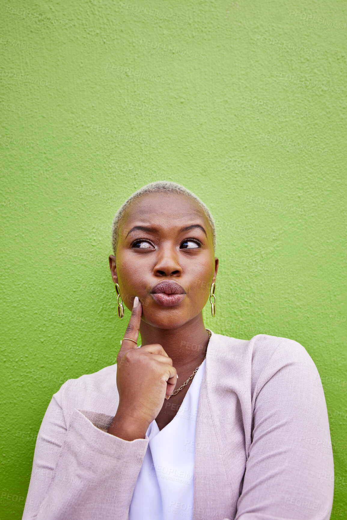 Buy stock photo Thinking, idea and young black woman by a green wall with trendy, classy and elegant outfit for fashion. Dreaming, mindful and African female model with positive and confident attitude with mockup.