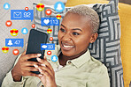 Black woman on sofa with phone, and emoji on social media, chat or video online in home. Happy face, smile and internet, girl on couch with connectivity on smartphone and funny viral meme or post.