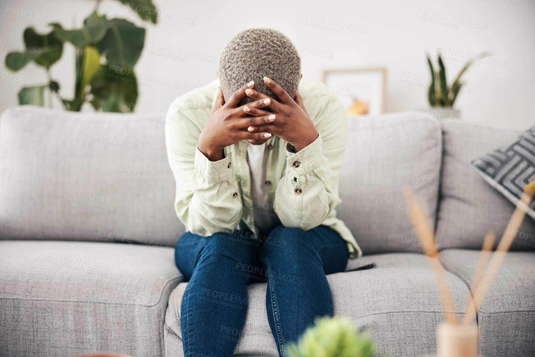 Buy stock photo Woman, headache and depression on sofa for mental health, anxiety and stress of bad mistake at home. Crying, sad and frustrated african person scared of trauma, worry and counselling of broken heart 