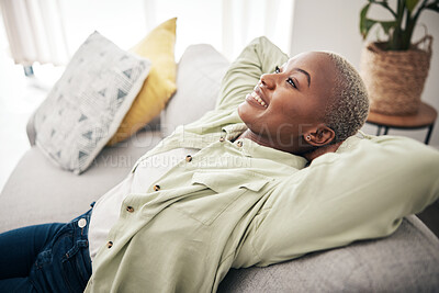 Buy stock photo African woman, relax and calm stretching on sofa in home, living room and lounge with peace, happiness and rest on weekend. Happy, face and mindset of freedom in new house or apartment with homeowner