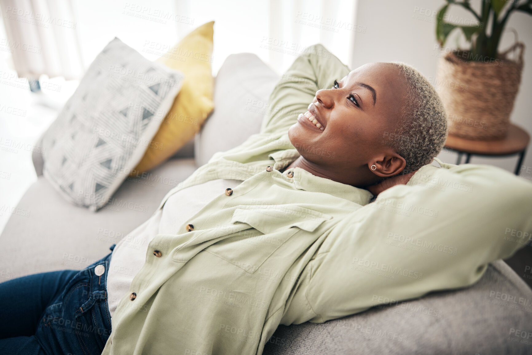 Buy stock photo African woman, relax and calm stretching on sofa in home, living room and lounge with peace, happiness and rest on weekend. Happy, face and mindset of freedom in new house or apartment with homeowner