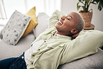 Tired, happy or black woman on sofa to relax in living room with head on hand for sleeping or nap time. Eyes closed, smile or calm African person resting on couch in apartment home or house for peace