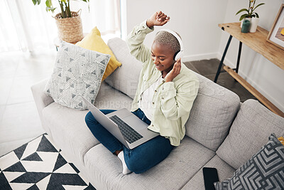 Buy stock photo Laptop, home or woman in headphones dancing to music or streaming to relax with freedom. Top view, smile or happy African person listening to a radio song or audio on sofa on an online subscription