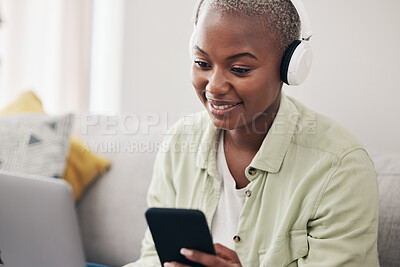 Buy stock photo Home, headphones or black woman with phone or laptop for social media, message or online chat. Smile, notification alert or African person streaming music on mobile app on website or network at home