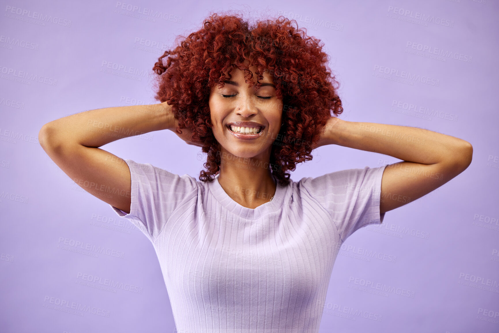 Buy stock photo Beauty, smile and woman with natural hair in studio for cosmetic, fun or care on purple background. Happy, haircare and face of lady model with red afro, dye and color, texture or growth satisfaction