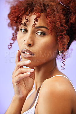 Buy stock photo Woman, hair and beauty with portrait and skincare in a studio, red curls and dermatology with makeup on purple background. Haircare, face and cosmetics and curly hairstyle with model from Brazil