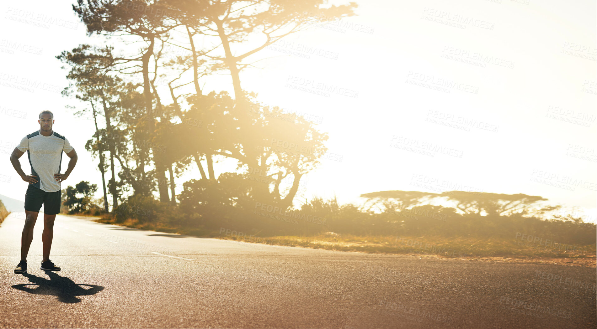 Buy stock photo Runner, street and man with fitness, sunshine and start race with health, wellness and workout outdoor. Banner, athlete and runner in road with exercise, training for marathon race and healthy