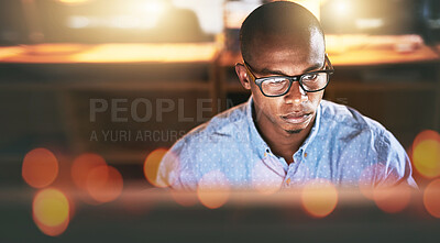 Buy stock photo Night, flare and a business black man at work on a computer in the office for an overtime deadline. Face, technology and glasses with a young employee working on a desktop late in the evening