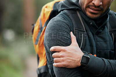 Buy stock photo Shoulder pain, injury and person hands with fitness, workout and travel accident from hike. Athlete, arm bruise and fail from trekking in the woods on a trail with muscle strain and backpack 