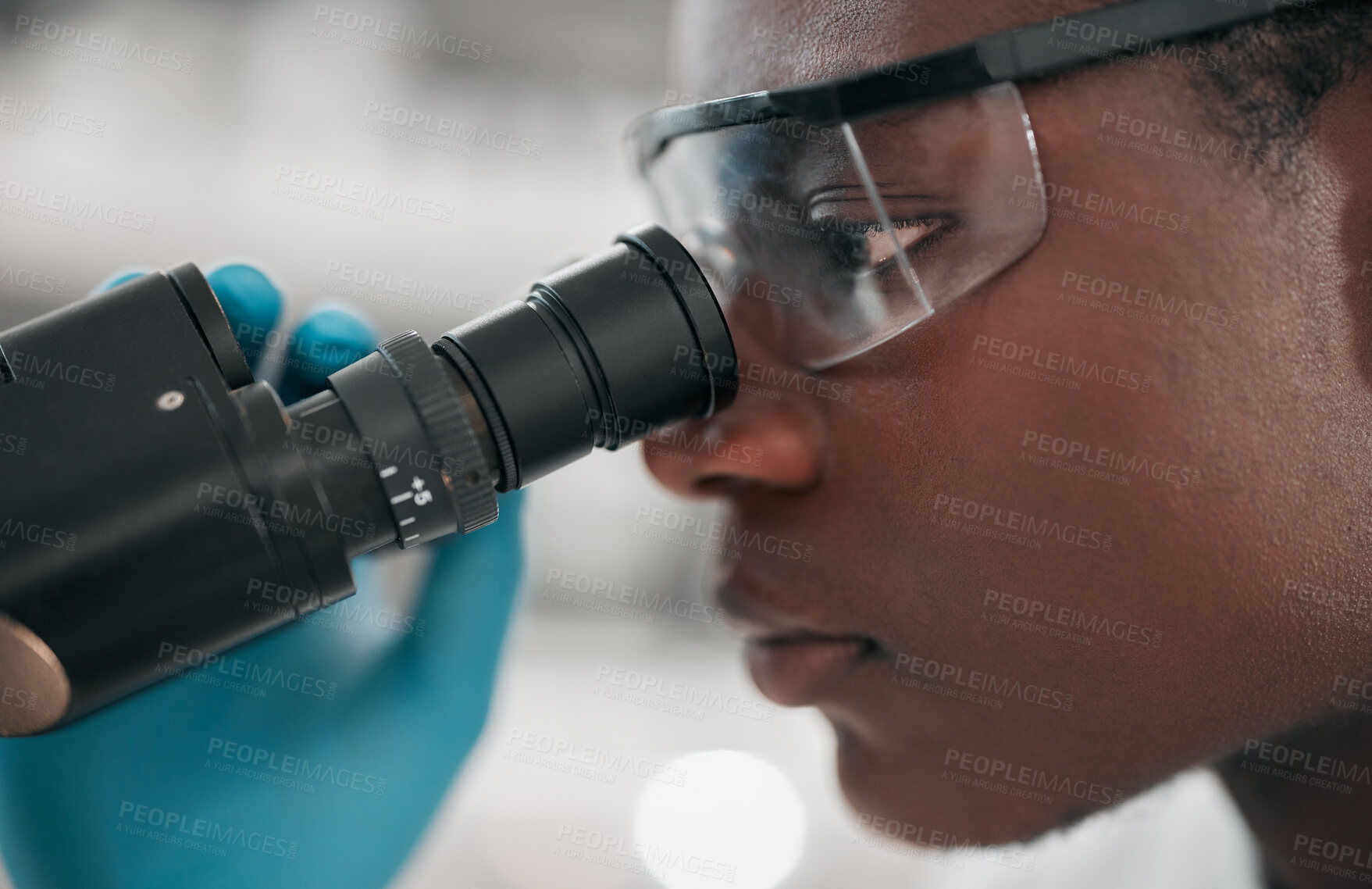 Buy stock photo Microscope, black man and healthcare with research, medical and dna test with biotechnology. African person, science and researcher with laboratory equipment, check sample and vaccine with analytics