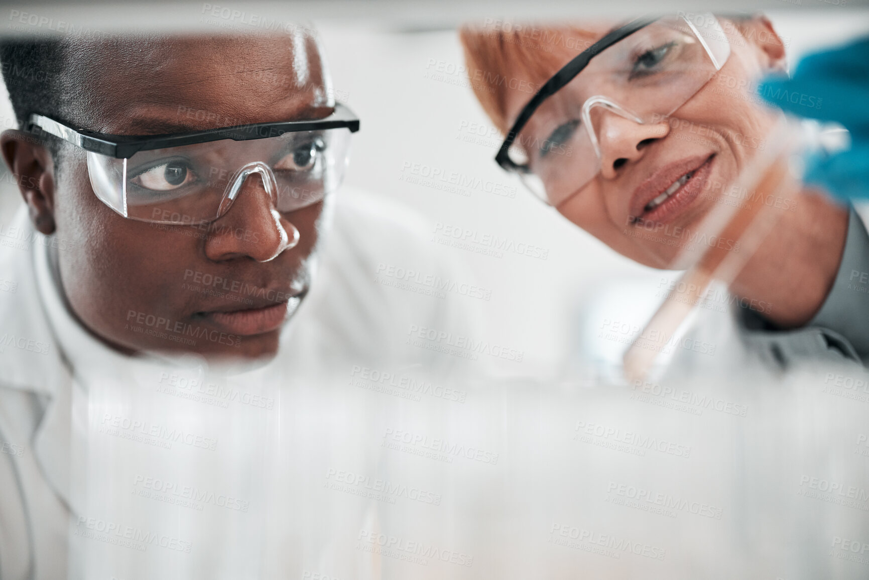 Buy stock photo Teamwork, medical and scientists with research, test tube and conversation with experiment, sample and results. Black man, woman and staff with analysis, vaccine development and cure with cooperation