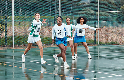 Buy stock photo Sports, netball team and portrait of women training in competition, game or match. Fitness, group and girls workout on court, exercise and practice performance on wet field outdoor for healthy body