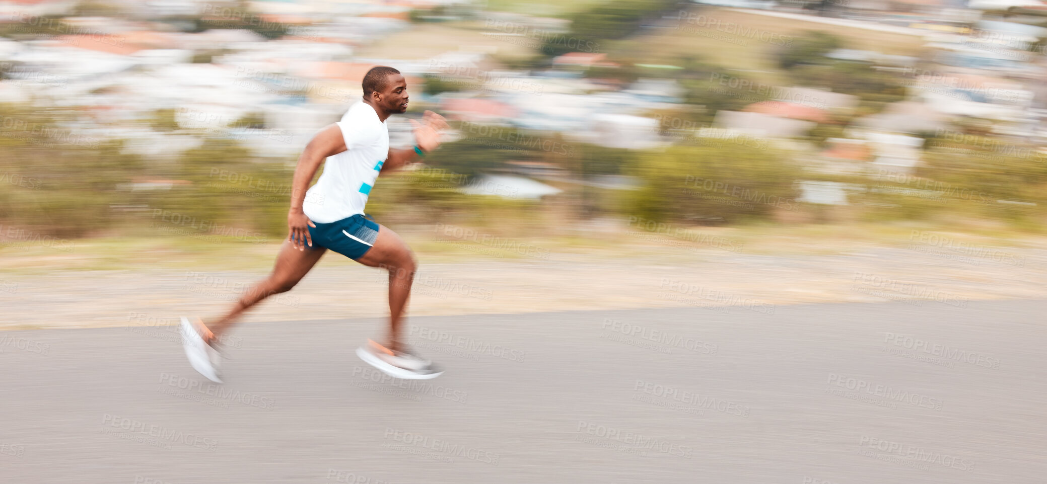 Buy stock photo Fast, road and a black man running for cardio, exercise and training for a marathon. Sports, health and an African runner or person in the street for a workout, fitness or athlete commitment