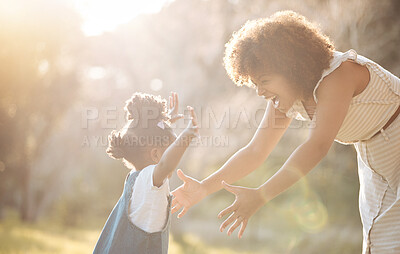 Buy stock photo Excited mother, kid and hug at park for love, care and bonding for trust, support and funny laugh outdoor. Happy mom, girl child and embrace in nature for interracial relationship of family together