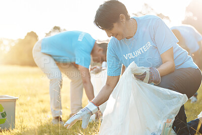 Buy stock photo Nature recycling, community service volunteer and happy woman cleaning garbage, trash or pollution. Earth Day teamwork, eco friendly environment and charity team help with sustainable park clean up