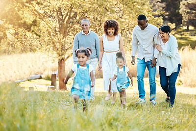 Buy stock photo Park, walking and happy family generations for bonding, having fun and talking together. Love, smile and children with parents and grandparents in nature in an outdoor green garden on weekend trip.