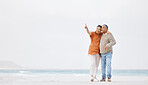 Beach, mockup and mature happy couple point at outdoor view, tropical advertising space or travel holiday destination. Retirement journey, relax walk and nature man, old woman or marriage people bond