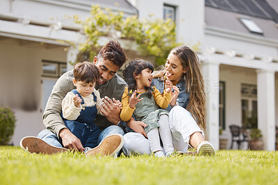 Buy stock photo Happy family, parents and children for picnic, relax and games on grass or garden outdoor in summer. Love, people and kids at home on ground for care, freedom and bonding in nature or environment