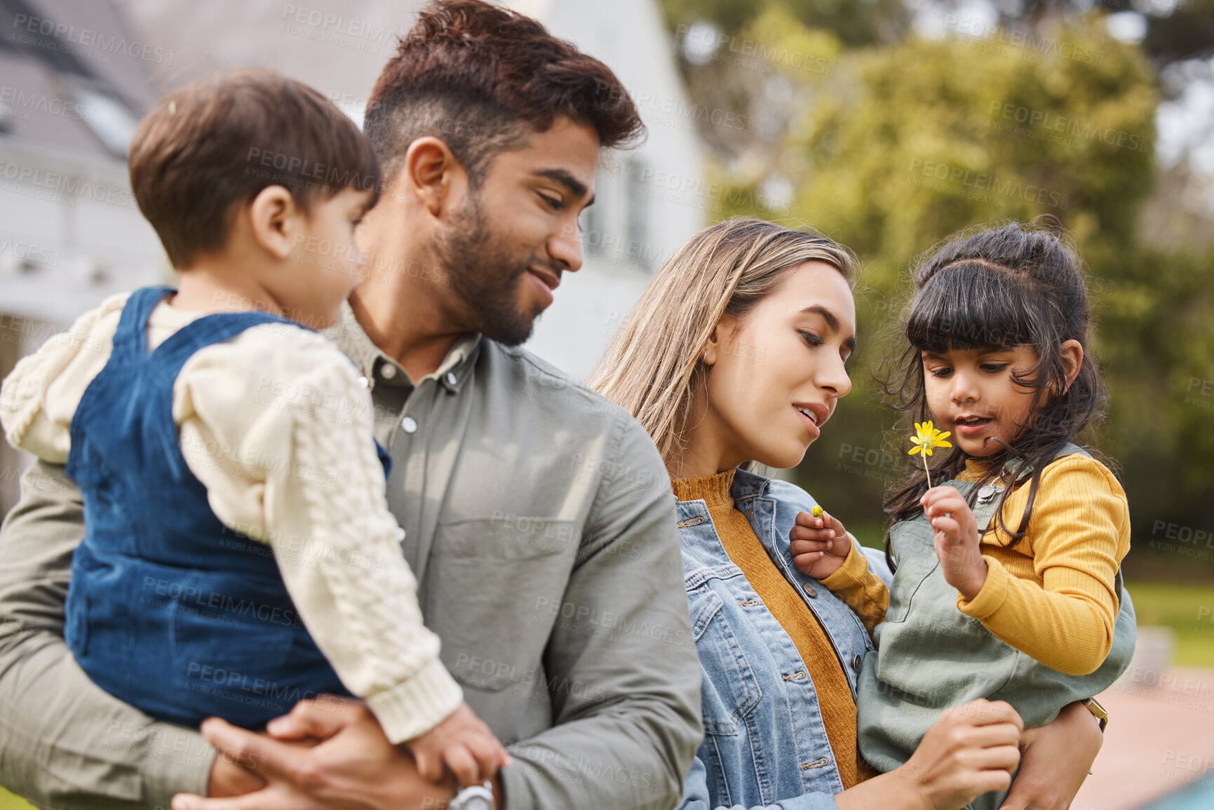 Buy stock photo Mother, father and children outdoor with a flower in spring with love, care and security. A man, woman or parents and kids together in a family backyard to relax while bonding on holiday or vacation