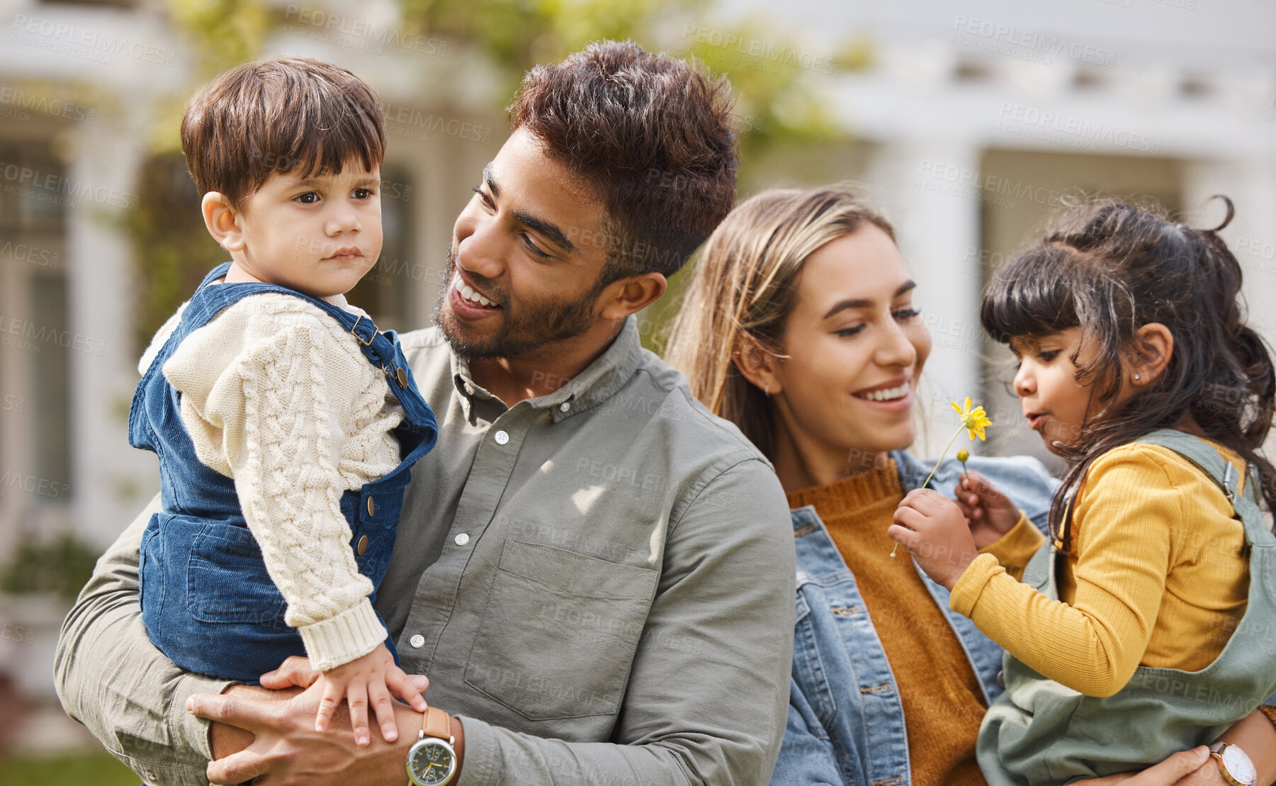 Buy stock photo Mother, father and happy outdoor with children and a flower in spring with love, care and security. A man, woman and kids or young family in a backyard to relax while bonding on holiday or vacation