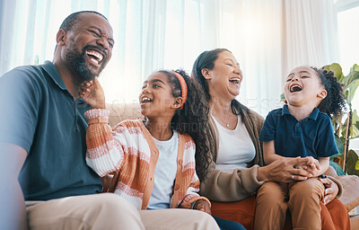 Buy stock photo Happy, laugh and children with parents on sofa in the living room with comic, comedy or funny joke. Happiness, smile and kids relaxing with their mother and father in the lounge at modern family home